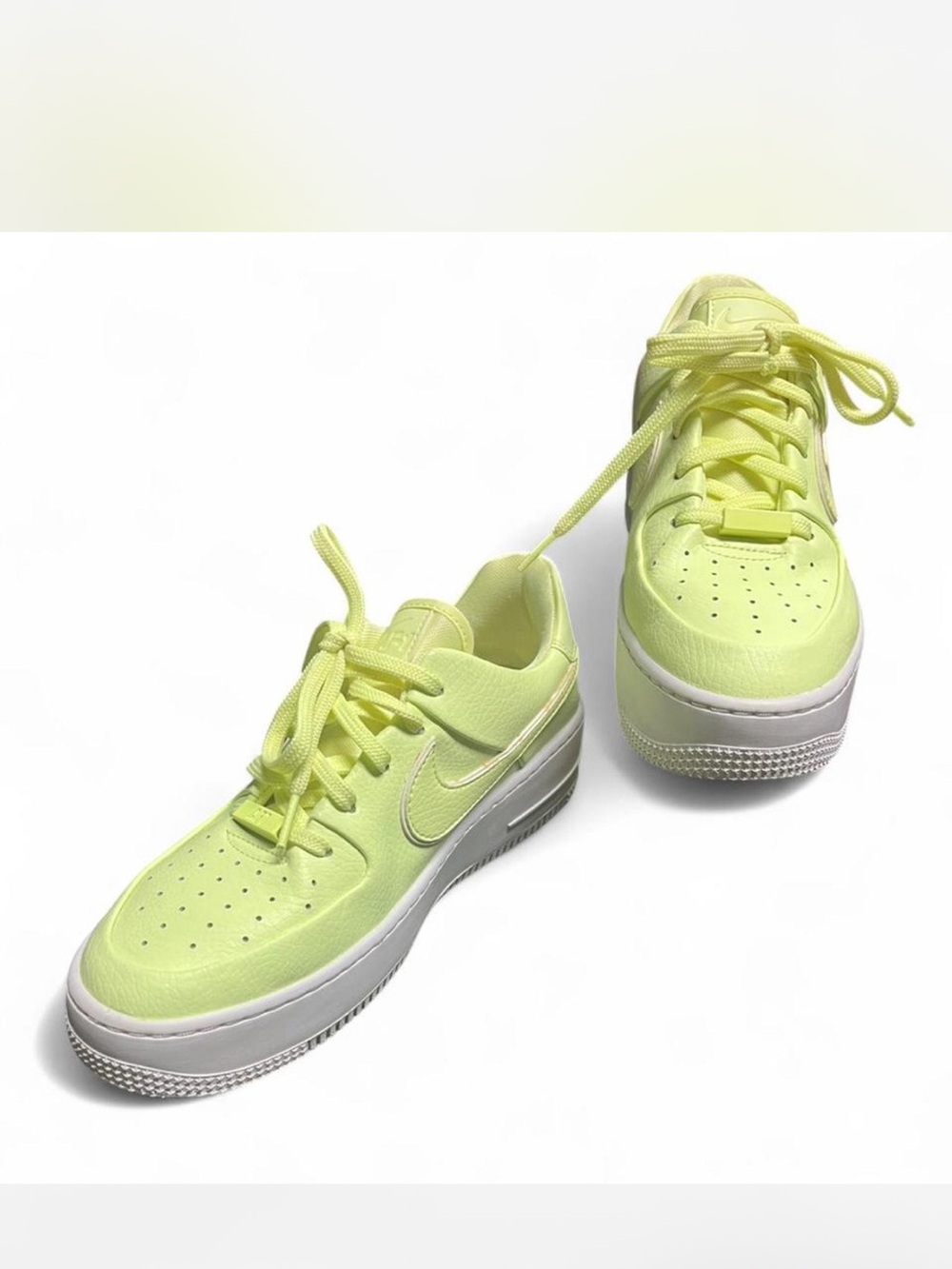 Nike Sage Low women’s Sneaker, Barely Volt color way .